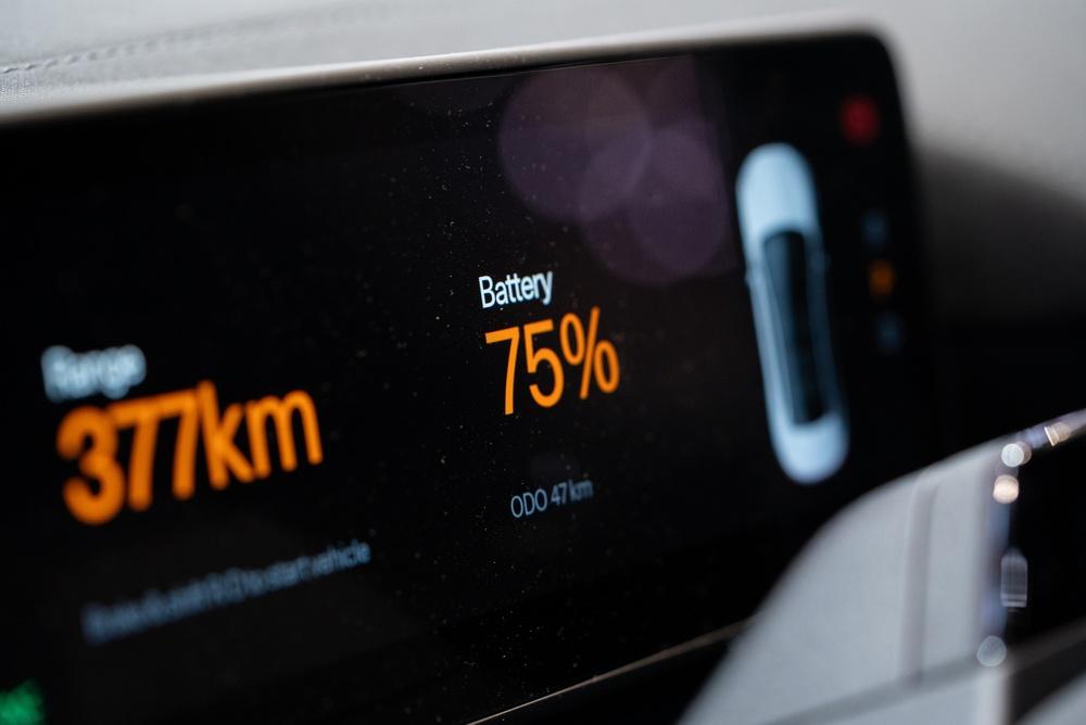 Charging an EV car in Iceland Dashboard showing an EV car charged up to 75% of its capacity