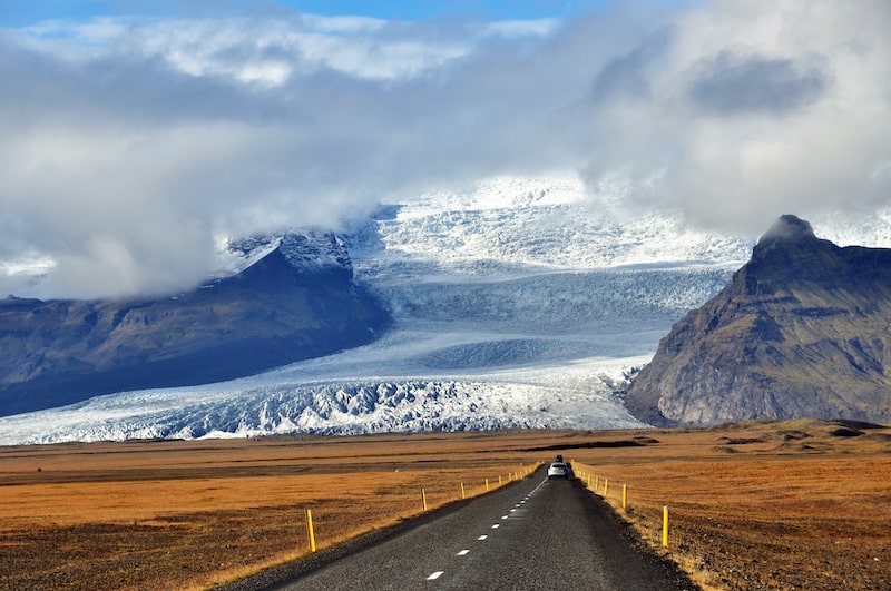 Icelandic road with the Vatnajokull national park at the background