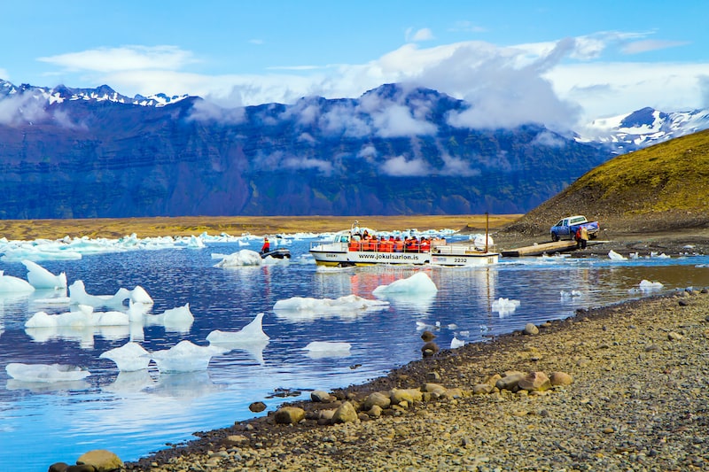 Tourists enjoying the views of the Jokulsarlon glacial lagoon