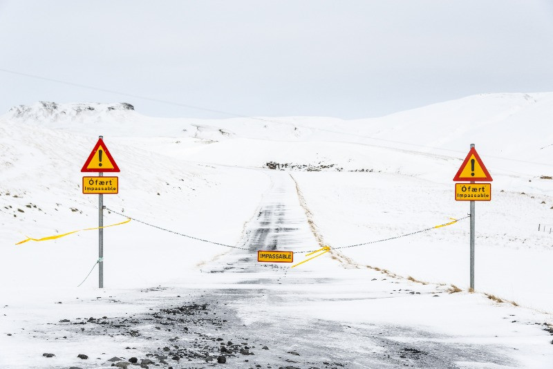 road closures informed with traffic signs and chains