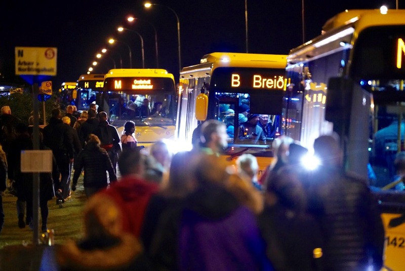 People boarding their bus in Reykjavik