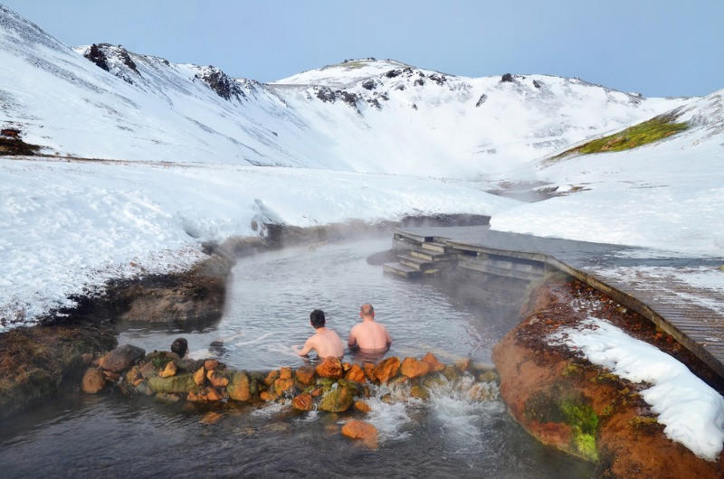 Men bathing in the hot waters of Reykjadalur