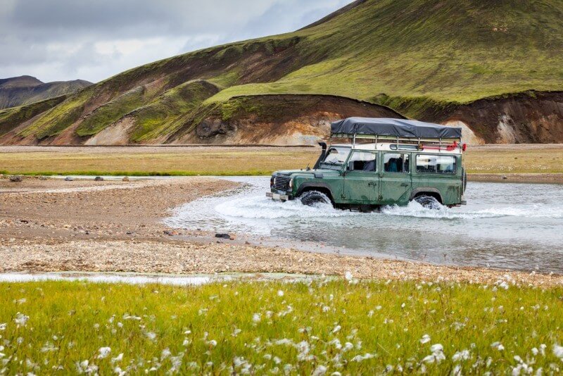 jeep crossing a river in Iceland