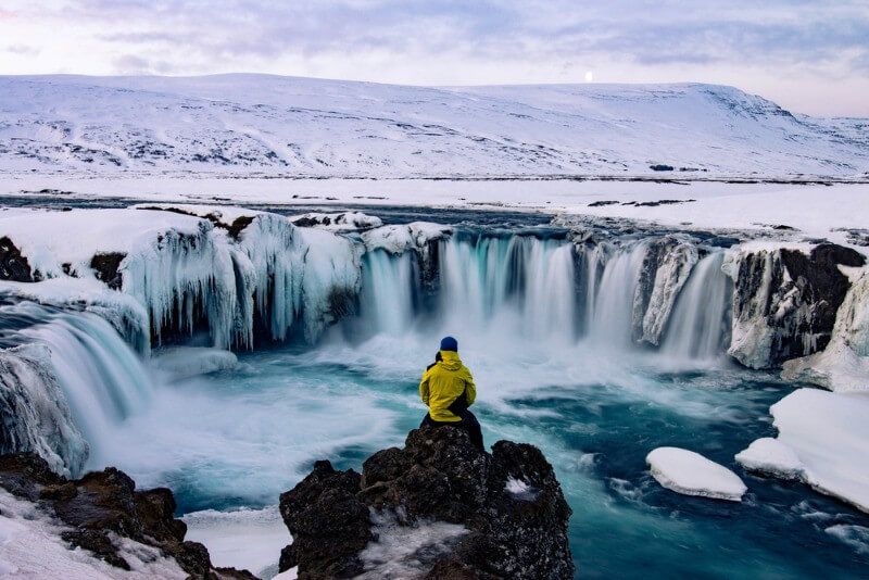 A visitor enjoying Iceland in Winter, a great time to visit Iceland