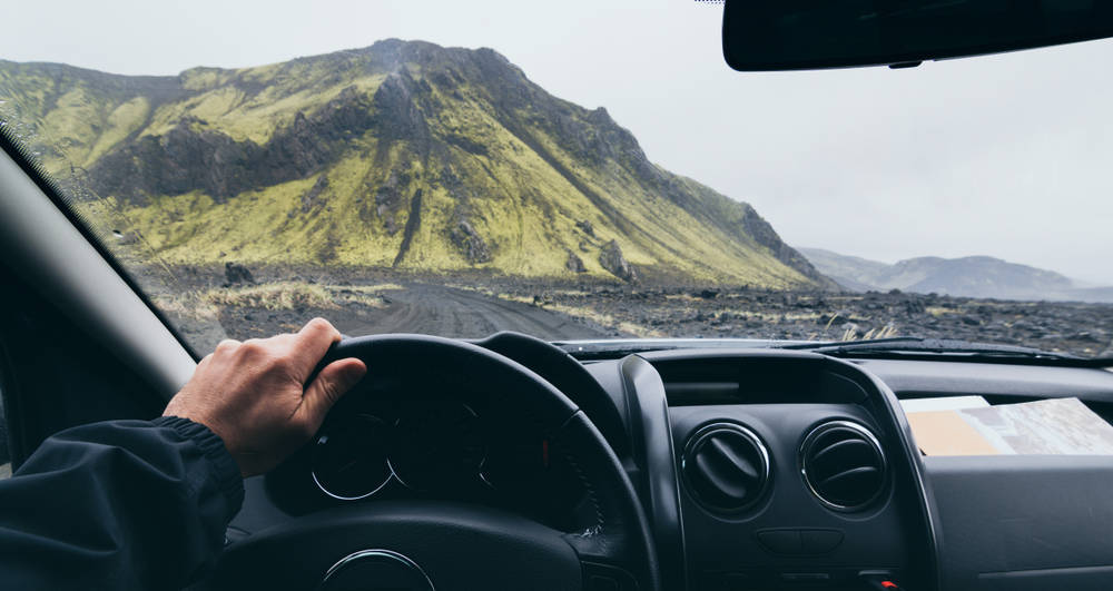 traveler driving a 4x4 vehicle on F Roads in Iceland