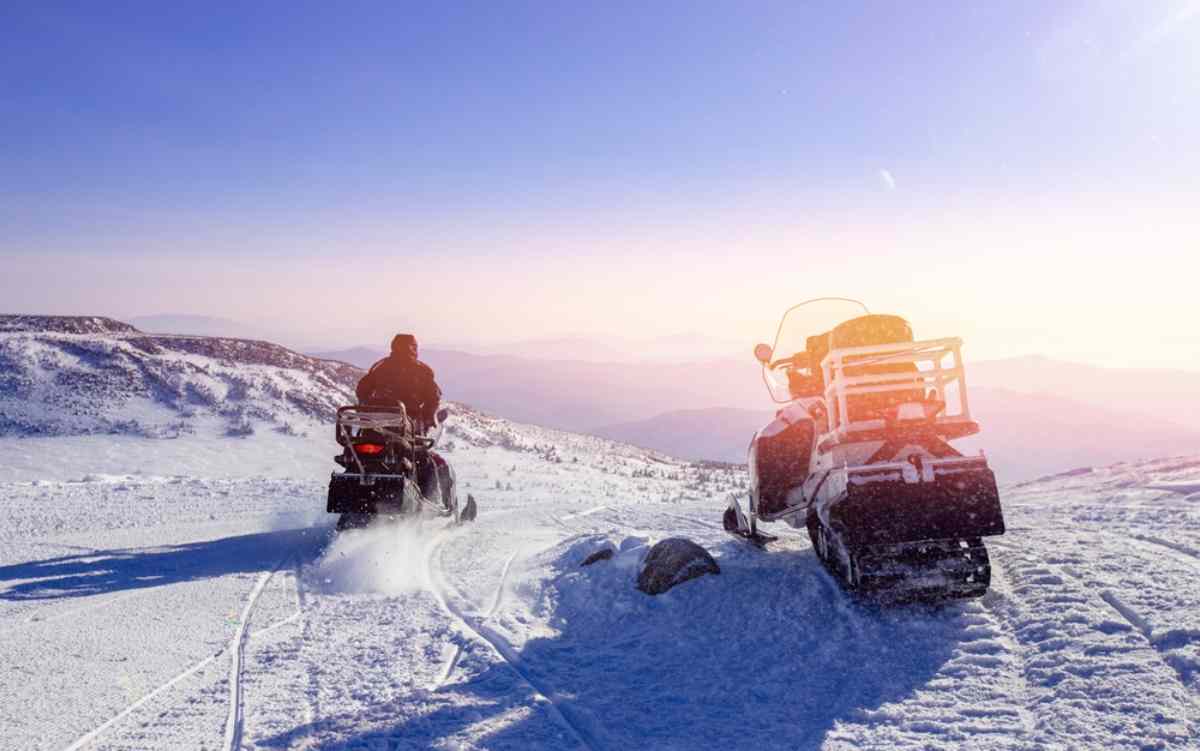 Snowmobile on the snowed mountains of Iceland
