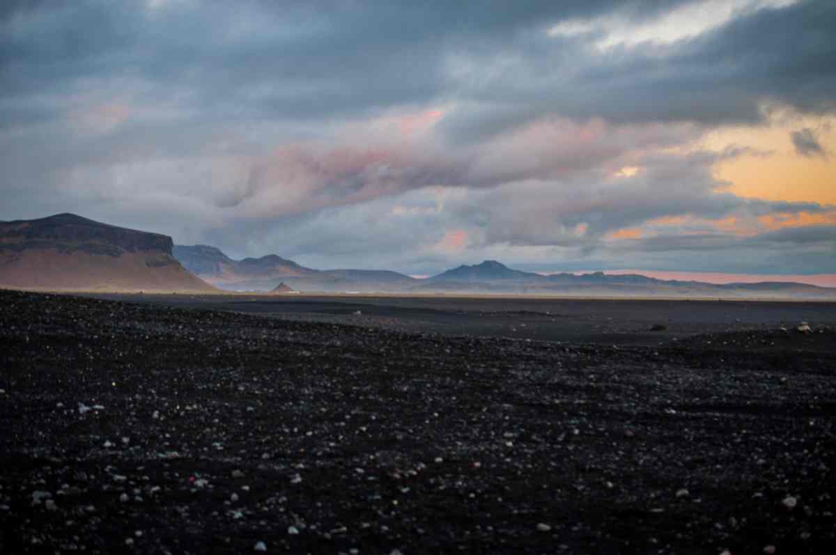 Hike through a black beach in Iceland
