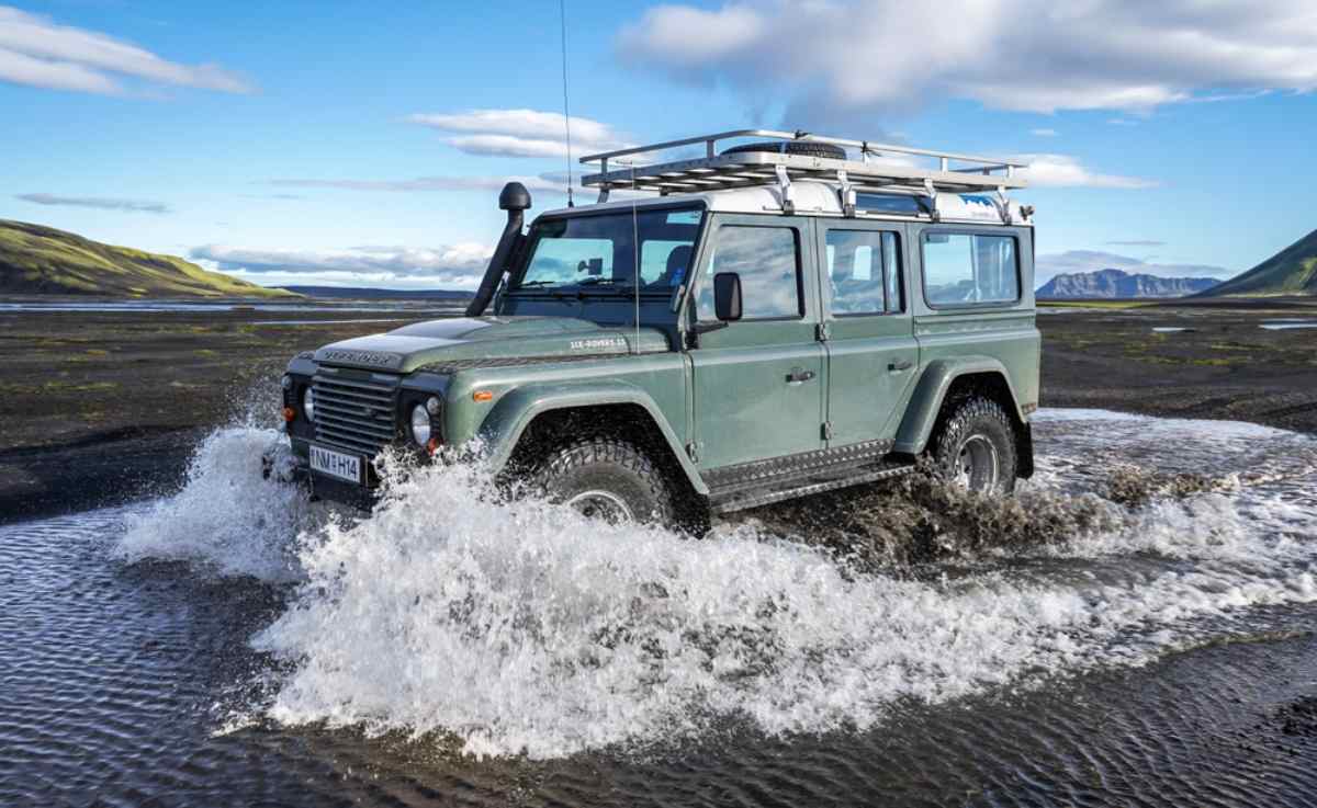 Super Jeep crossing a river on F249