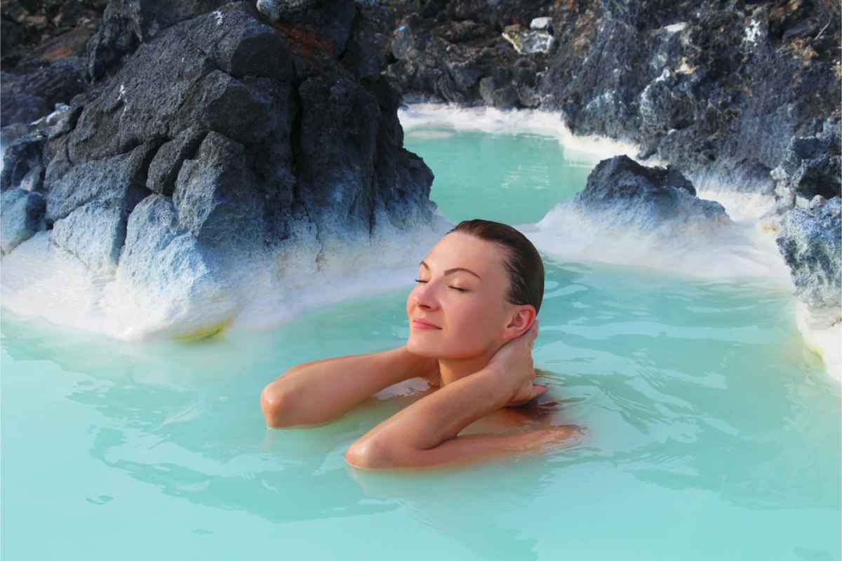 woman bathing in Iceland's Blue Lagoon