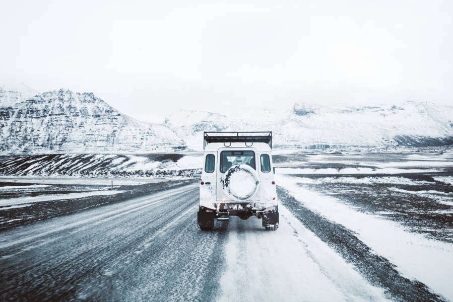 JDriver with a jeep driving responsibly in Iceland during the winter time