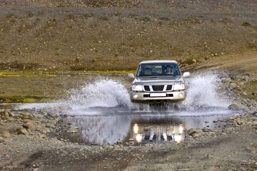 vehicle fording a river in Iceland